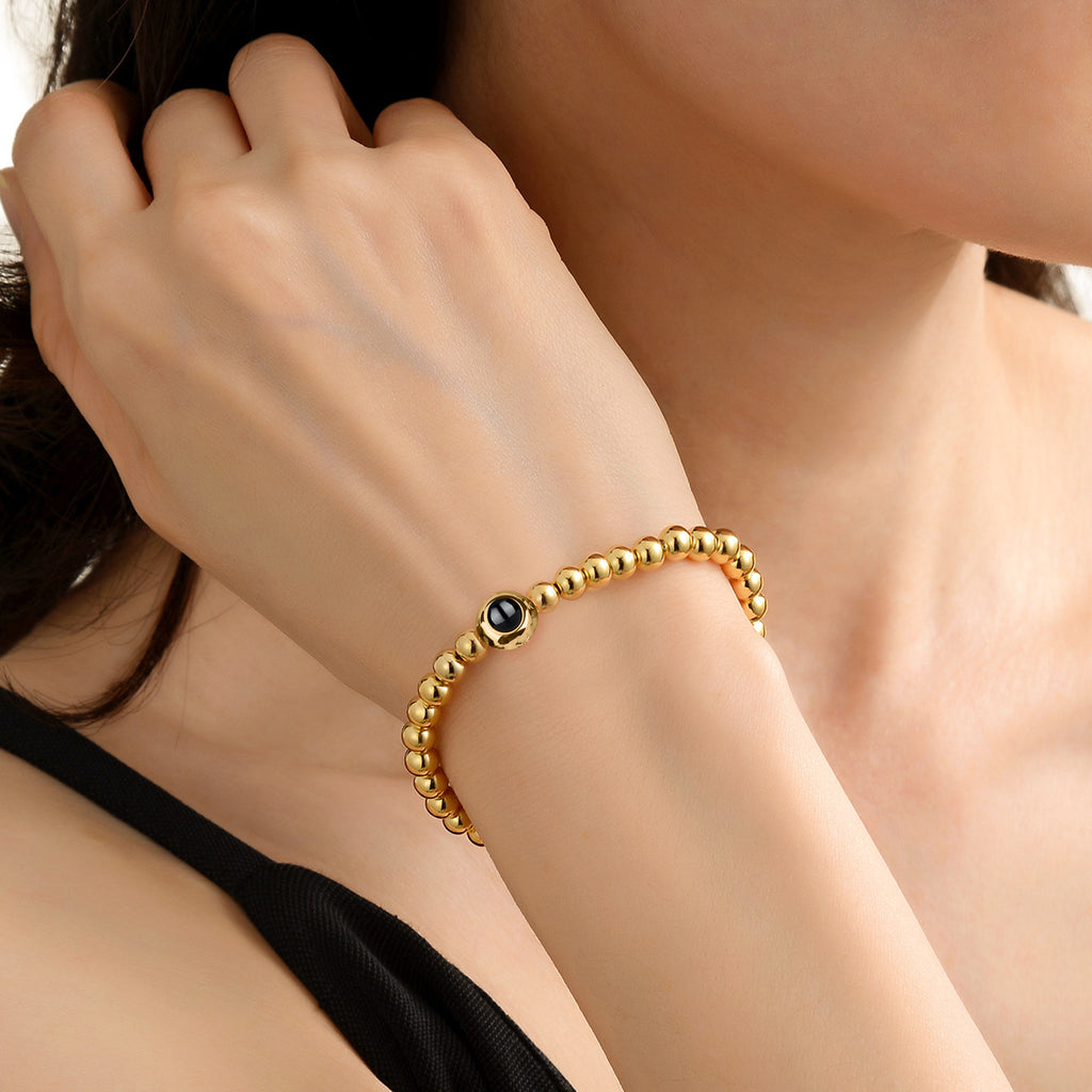 gold projection bracelet